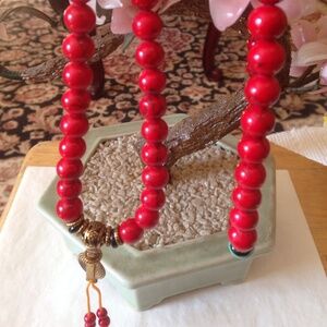 Vintage one of a kind coral  Buddha prayer